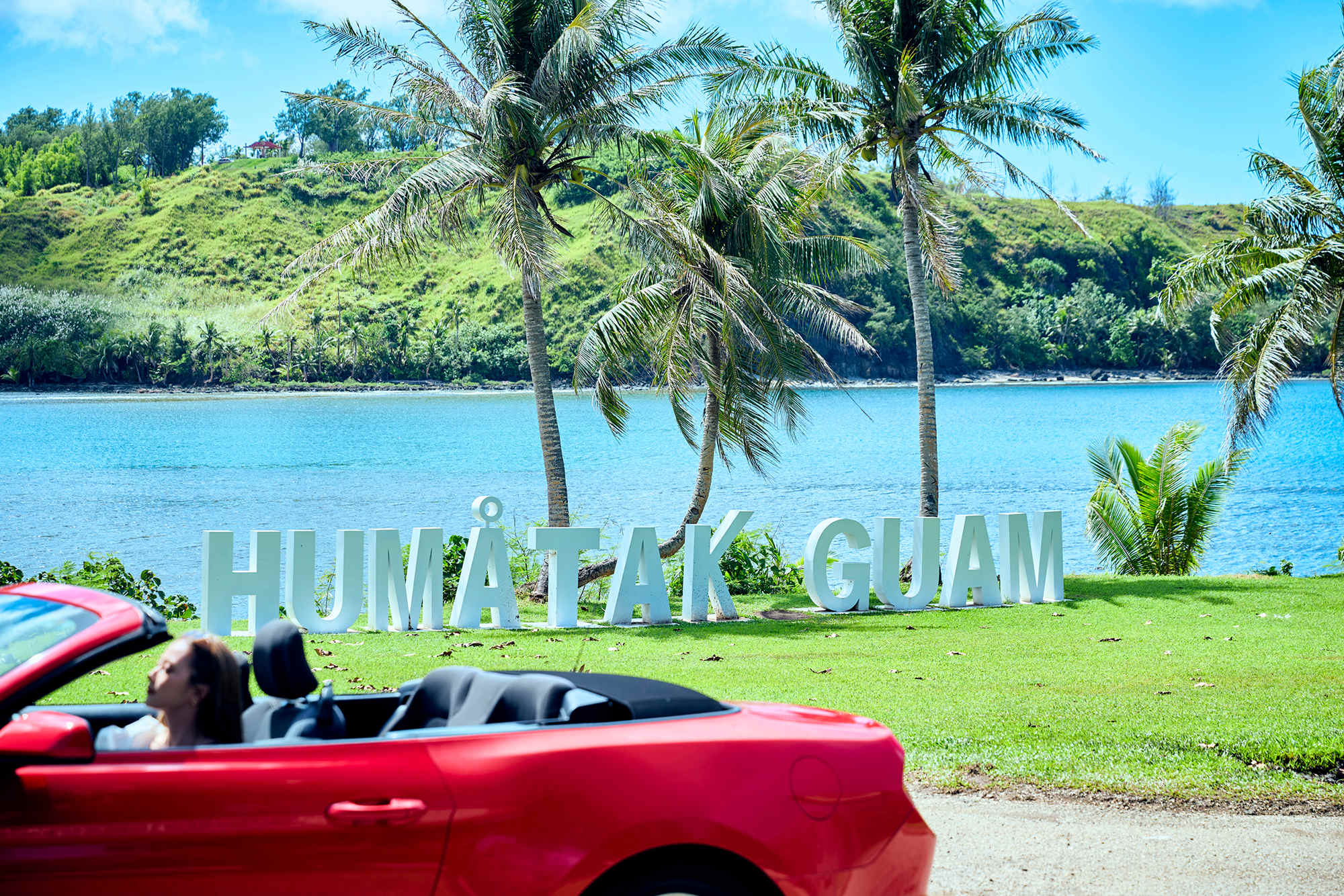 ウマタック村のロゴ